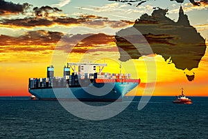 Container ship at sunset on sea