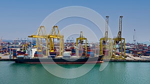 Container ship terminal, and quay crane of container ship at industrial port with shipping container