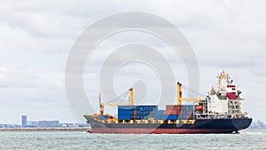 Container ship transporting cargo logistic to import export goods internationally around the world, including Asia Pacific and