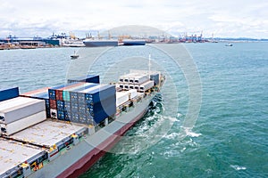 Container ship transporting cargo logistic to import export goods internationally around the world, including Asia Pacific and