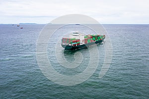 Container ship transporting cargo logistic to import export goods internationally around the world, including Asia Pacific and
