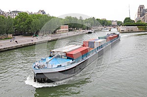 Container tanker Seine river cityscape Paris France