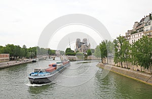 Container tanker Seine river cityscape Paris France