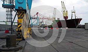 Container terminal. Sea port container terminal during work at night in fog