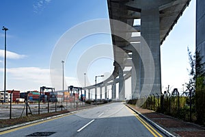 The container terminal under the stonecutters bridge in Hong Kong