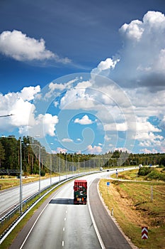 Container truck moving on highway