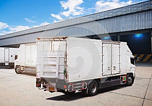 Container Trucks on The Parking Lot at Warehouse. Cargo Container Shipping. Freight Truck Logistics, Cargo Transport.