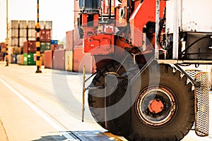 Containers with forklift car.