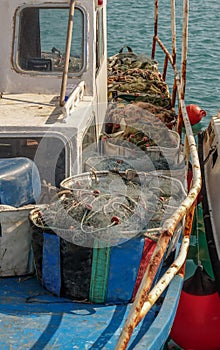 Containers full of fisherman`s nets