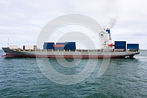 containers ship corgo logistic transportation import export international sailing in sea Photograph angle view from drone of point photo