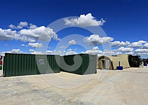 Containers and the tent