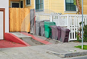 Containers for trash, recycling and yard waste