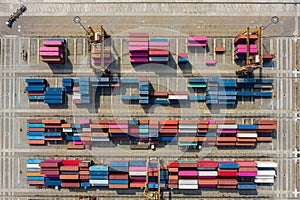 Containers warehouse and crane aerial top view in Thailand