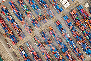 Containers warehouse and crane aerial top view in Thailand