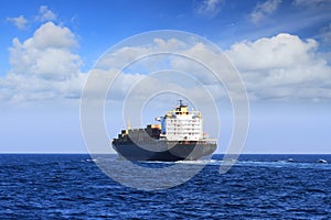 Containership sailing sailing in open waters photo