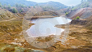 Contaminated surface of abandoned copper mine near Sia, Cyprus photo