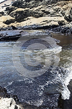 contamination with oil spill catastrophe and spill of 11,900 barrels of crude oil from the Repsol company on the