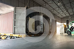 Contaner Trailer Trucks Parked Loading at Dock Warehouse. Shipping Cargo Container Delivery. Distribution Warehouse Logistics.