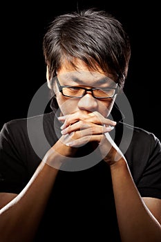 Contemplate Asian man photo