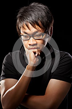 Contemplate Asian man photo