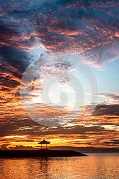 Contemplating and Meditation Pavilion In The Middle of Ocean During Sunset/Sunrise. Concept of Dawn of New Day or Era