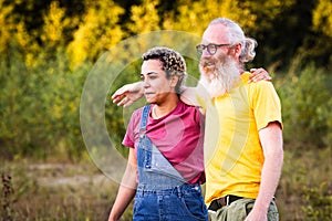 Contemplative Couple Enjoying a Sunset Nature Walk