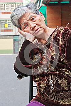 Contemplative elderly woman