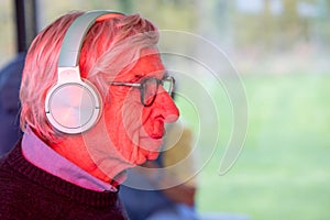 Contemplative Journey: Senior Man with Headphones
