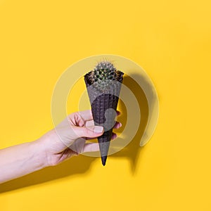 Contemporary art collage. Concept Cactus ice cream on bright yellow background. Minimal summer season banner, copy space, depilate photo