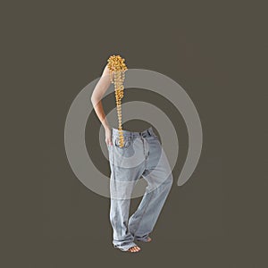 Contemporary art collage. Creative design. Modern fashion. Female body silhouette standing in jeans and golden necklace