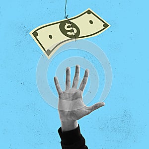 Contemporary art collage. Human hand reaching money over blue background. Financial growth motivation