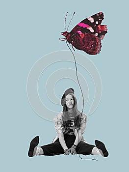 Contemporary art collage. Stylish teen girl holding butterfly like air balloon isolated on blue background