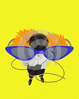 Contemporary art collage with young guy, man with stylish haircut wearing huge sunglasses over yellow background. Top