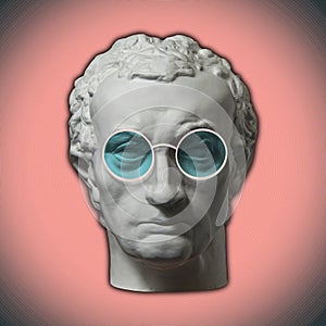 Contemporary art concept collage with antique statue head in a zine culture style. Male face with glasses.