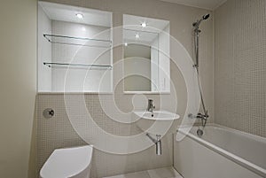 Contemporary bathroom with mozaic tiles