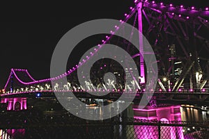 Contemporary construction of bridge in pink lights