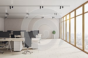 Contemporary coworking office interior with computers