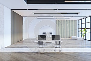 Contemporary coworking office interior with window and city view. Interior designs concept.