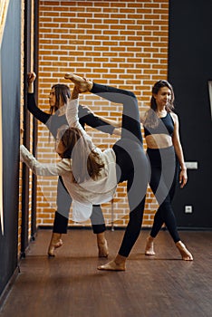 Contemporary dance performers, stretching exercise