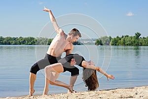 Contemporary dance. Young couple dancing.