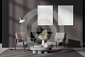 Contemporary dark grey modern living room interior with fireplace, armchairs. Two posters in a row template mockup on wall