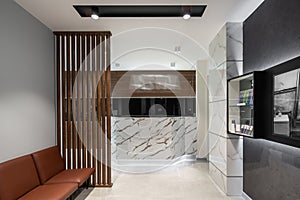 Contemporary dental clinic with light interior and reception