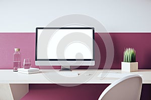 Contemporary designer desktop with empty black computer screen