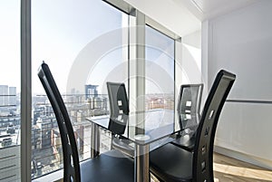 Contemporary dining area with city views