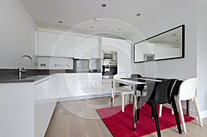 Contemporary fully fitted kitchen in white