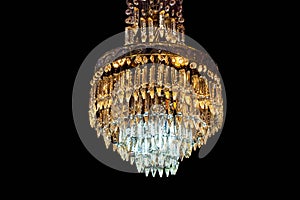 Contemporary glass chandelier isolated over black background