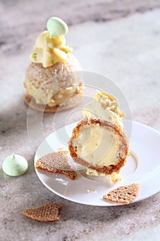 Contemporary key lime choux buns with craquelin