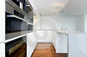 Contemporary kitchen with top spec appliances