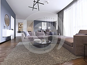 Contemporary large living room in a new apartment with a large sofa and dining area