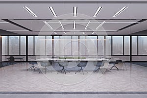 Contemporary light coworking office interior with glass reflections, furniture, equipment and other items. Workplace and